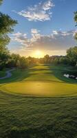 Stunning sunset over a serene golf course with water features and lush greens in the distance photo