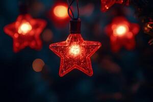 Red glitter star decorations shining brightly at night during the festive holiday season photo