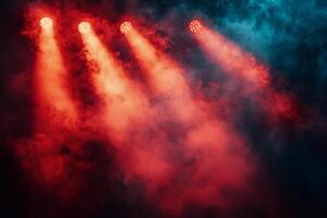 Bright red stage lights illuminate smoky atmosphere in a dramatic performance setting photo