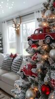 Decorated Christmas tree featuring red toy trucks and ornaments in a cozy living room setting photo