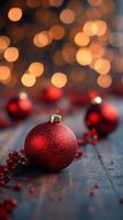 Decorative red ornament with sparkling finish on wooden table during festive season photo