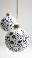Elegant black and white decorative ornaments hanging for festive celebrations during winter season photo