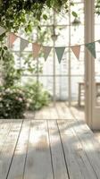 Charming outdoor setting with pastel bunting and floral arrangement at a garden party photo