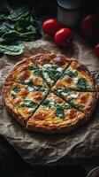 Freshly baked savory quiche with spinach and cheese accompanied by tomatoes and herbs photo