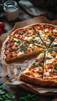 Freshly baked savory quiche with spinach and cheese accompanied by tomatoes and herbs photo