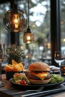 Delicious cheeseburger served with fresh salad and sides at a cozy restaurant during dinner time photo