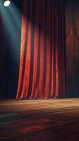 Red velvet curtains illuminated by a spotlight in a wooden theater setting during a performance photo