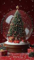 A festive snow globe featuring a decorated Christmas tree and presents set against a red backdrop photo