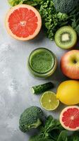 Fresh green smoothie with fruits and vegetables on a wooden countertop in natural light photo