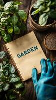 Gardening activities with gloves, plants, and a notebook on a wooden table in early spring photo