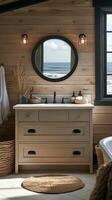 Elegant bathroom design featuring a modern basin and illuminated mirror overlooking the sea photo