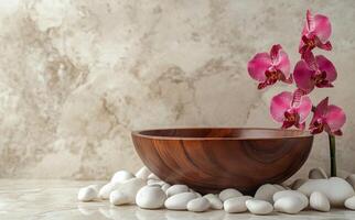 Elegant orchid arrangement in a wooden bowl on smooth stones with a serene backdrop photo
