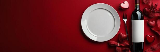 Elegant dining setup with plate, wine, fork, and hearts on a red table for romantic occasions photo