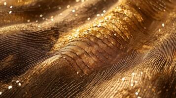 Close-up of a Golden Fabric with a Glittering Texture photo