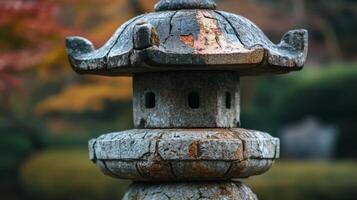 Closeup of a Weathered Stone Pagoda in a Garden Setting photo