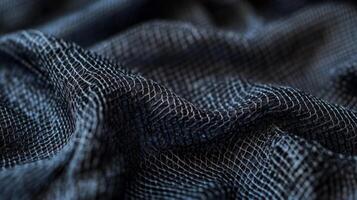 Close-up of a Black Net-Like Fabric with a Distinctive Pattern photo
