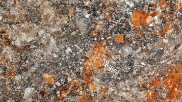 Close-up of a Rough, Weathered Stone Surface with Rusty Patches photo