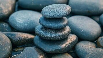 Stack of Smooth, Gray Stones with a Watery Sheen photo