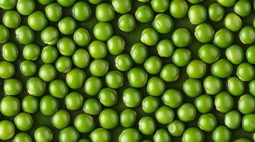 Close-Up of Green Peas Arranged in a Pattern photo