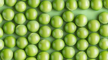 Close-up of Green Peas Arranged in a Pattern photo