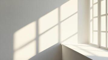 Window Light Casting Shadow on White Wall and Windowsill photo