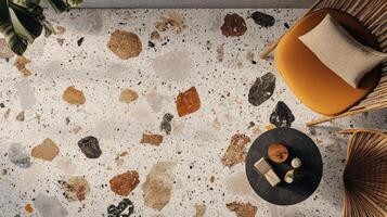 Top View of Terrazzo Floor with Chairs and Table photo