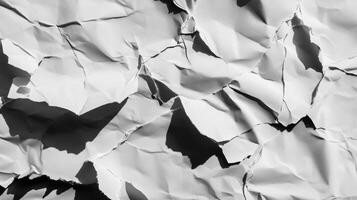 Close-up of a Crumpled and Torn White Sheet of Paper photo