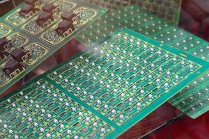 Printed circuit boards with LEDs on a stand photo
