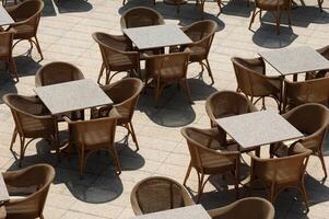 Many empty tables photo