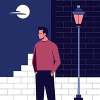 Man standing in front of a brick wall and a street lamp vector