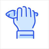 A hand holding a fish in its hand vector