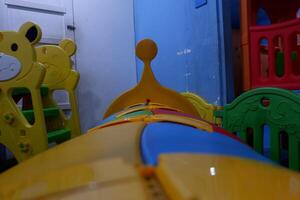 Modern kid's playground with slide and balls indoor photo