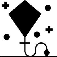 A black and white kite with dots on it vector