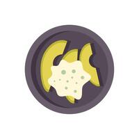 Sliced avocado with sauce on a round plate vector