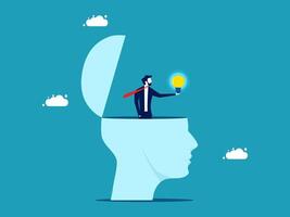 man is standing inside of a head with a light bulb vector