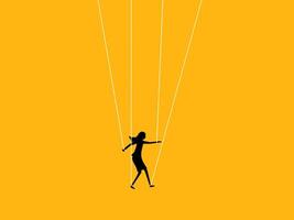 Control of people. Businesswoman is controlled by the strings vector
