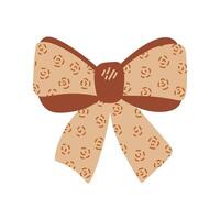 A brown bow with a brown and white pattern vector