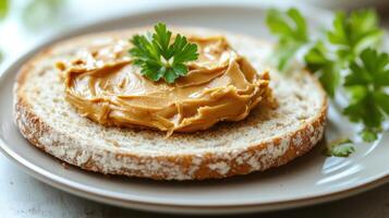 Warm bread with creamy peanut butter and parsley, inviting and delicious photo