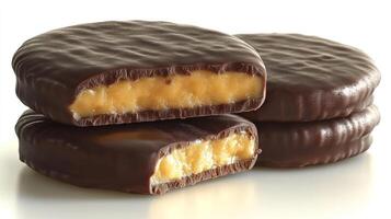 Delicious chocolate-coated snacks feature a smooth, rich center, perfect for any craving photo