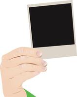 A hand holding a blank photo frame vector