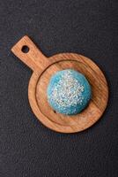Delicious colorful asian mochi sweets with rice dough shell and fruit filling photo