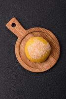 Delicious colorful asian mochi sweets with rice dough shell and fruit filling photo
