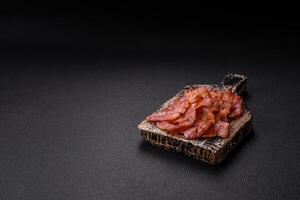 Delicious crispy bacon grilled with salt and spices photo