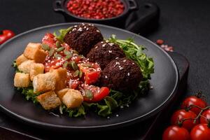 Hearty delicious fried falafel made from chickpeas, cumin, hummus with salt and spices photo