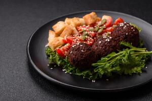 Hearty delicious fried falafel made from chickpeas, cumin, hummus with salt and spices photo