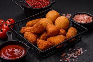 Brie cheese or camembert fries in breading, fast food, takeaway photo