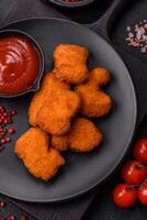 Delicious fresh crispy chicken nuggets, unhealthy food, fast food photo