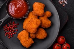 Delicious fresh crispy chicken nuggets, unhealthy food, fast food photo