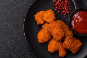 Delicious fresh crispy chicken nuggets, unhealthy food, fast food photo