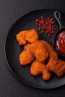 Delicious fresh crispy chicken nuggets, unhealthy food, fast food photo